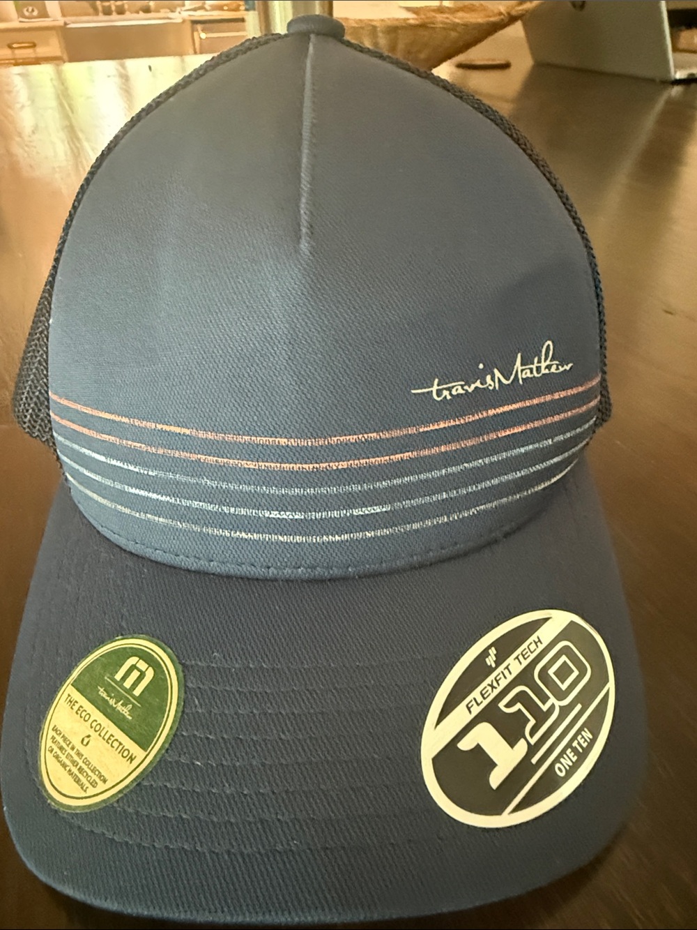 Travis Mathew Navy Trucker Cap with Multi-Stripe Accent